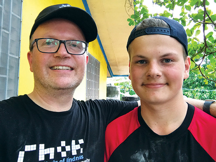 p26 Andrew and son Declan - volunteering
