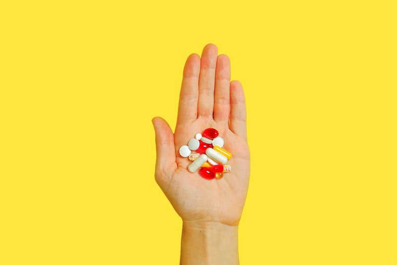 Handful of vitamins Handful of vitamins