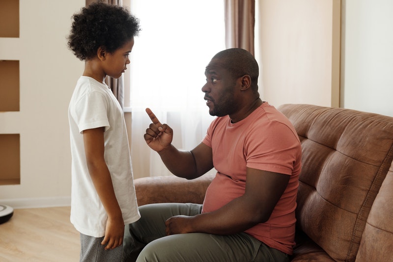 Parent disciplining child Parent disciplining child