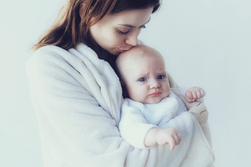 Mum holding baby